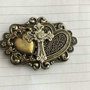 Vintage brooch with cross